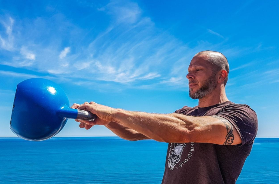 a man exercising and thinking about fitness metrics that matter